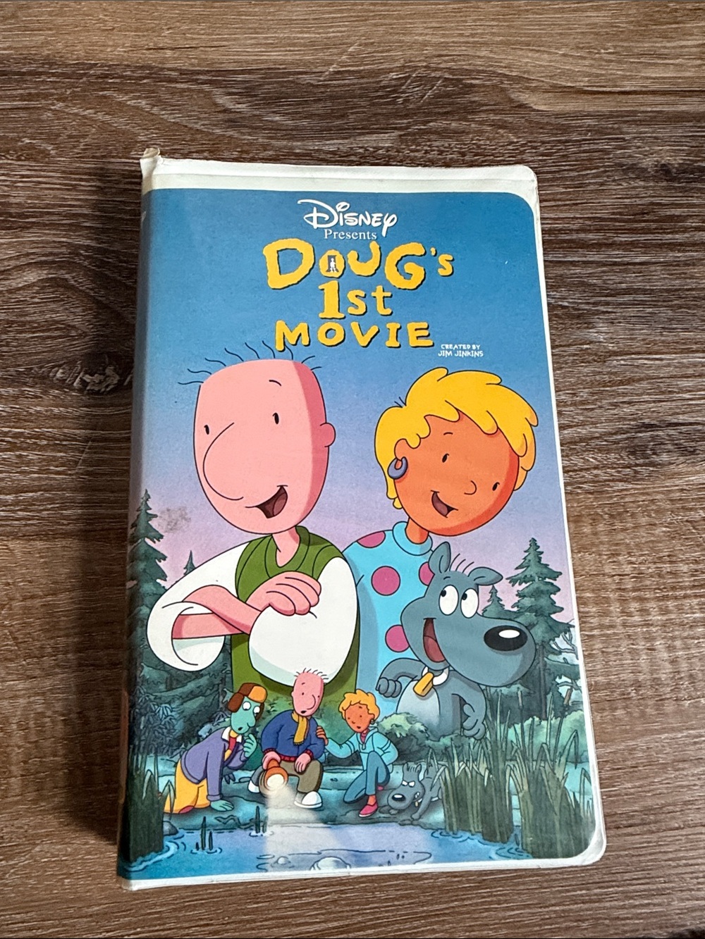 Disney Doug's 1st Movie — Blue and Yellow Illustrated Cover VHS